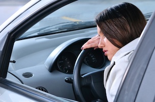 Woman Asleep at the Wheel